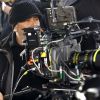 Luc Besson derrière la caméra pour le film Lucy (Photo : Jessical Forde)