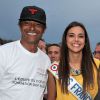 Yannick Noah et Marine Lorphelin (Miss France 2013) lors du départ de la 28e Course Du Coeur pour soutenir le don d'organes au Trocadéro à Paris, le 2 avril 2014