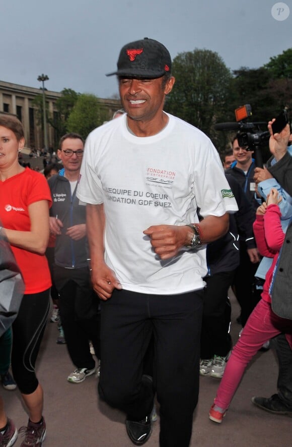 Yannick Noah lors du départ de la 28e Course Du Coeur pour soutenir le don d'organes au Trocadéro à Paris, le 2 avril 2014