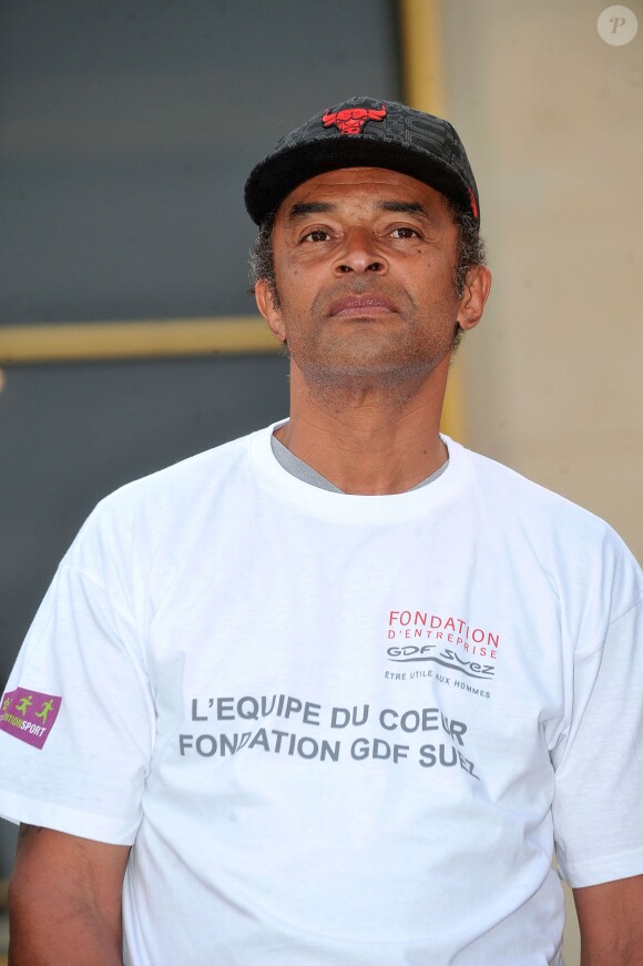 Yannick Noah lors du départ de la 28e Course Du Coeur pour soutenir le don d'organes au Trocadéro à Paris, le 2 avril 2014