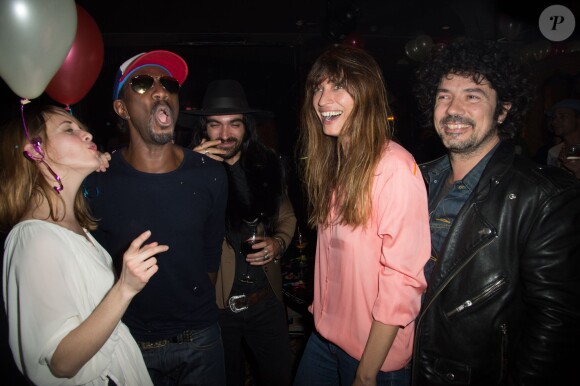 Capucine Delaby, Marco Prince, Yarol Poupaud et sa compagne Caroline de Maigret lors de la soirée d'anniversaire des 4 ans du Bus Palladium, à Paris le 3 avril 2014.
