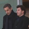 Nicolas Sarkozy et Michaël Youn au stade Stamford Bridge à Londres pour le match Chelsea-PSG en Ligue des Champions le 8 avril 2014. 