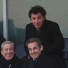 Jean Sarkozy, Jean-Claude Darmon, Nicolas Sarkozy et Michaël Youn au stade Stamford Bridge à Londres pour le match Chelsea-PSG en Ligue des Champions le 8 avril 2014. 