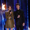Shailene Woodley et Ansel Elgort sur la scène des MTV Movie Awards 2014, le 13 avril 2014.