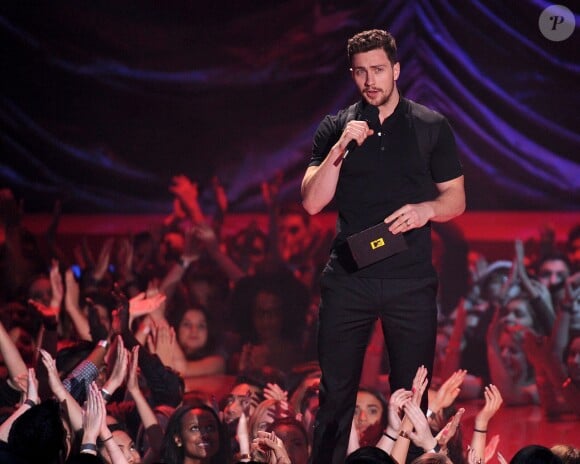 Aaron Taylor-Johnson sur la scène des MTV Movie Awards 2014, le 13 avril 2014.