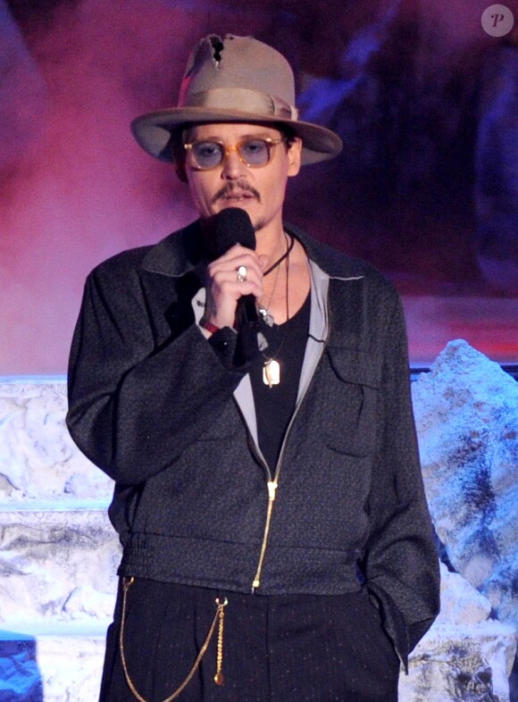 Johnny Depp  sur la scène des MTV Movie Awards 2014, le 13 avril 2014.