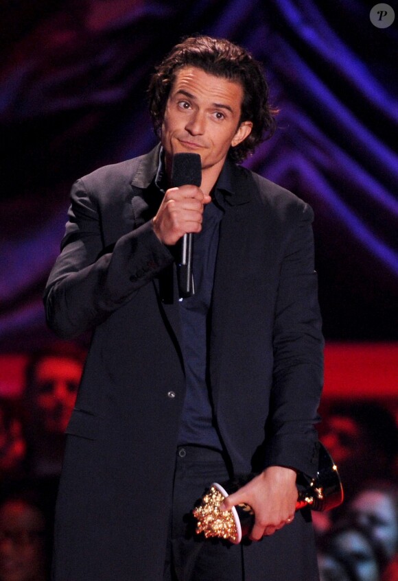 Orlando Bloom sur la scène des MTV Movie Awards 2014, le 13 avril 2014.