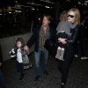 Nicole Kidman, son mari Keith Urban et leurs filles Faith Margaret et Sunday Rose arrivent à l'aéroport LAX de Los Angeles, le 26 mars 2014.
