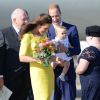 Le prince George, arrivant en Australie avec ses parents William et Kate le 16 avril 2014, a fait d'une certaine manière sensation en portant une barboteuse.