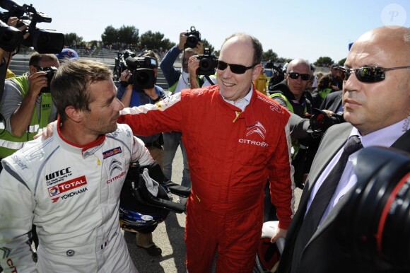 Le prince Albert II de Monaco est venu assister aux qualifications d'une épreuve de championnat WTCC, au circuit Paul Ricard du Castellet, auxquelles le pilote Sébastien Loeb participe le 19 avril 2014.