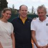 Tatiana Golovin, le prince Albert II de Monaco, Patrick Poivre d'Arvor et Arnaud Boetsch à l'entraînement pour un match en double lors du Tennis Rolex Masters de Monte Carlo à Monaco le 19 avril 2014 
