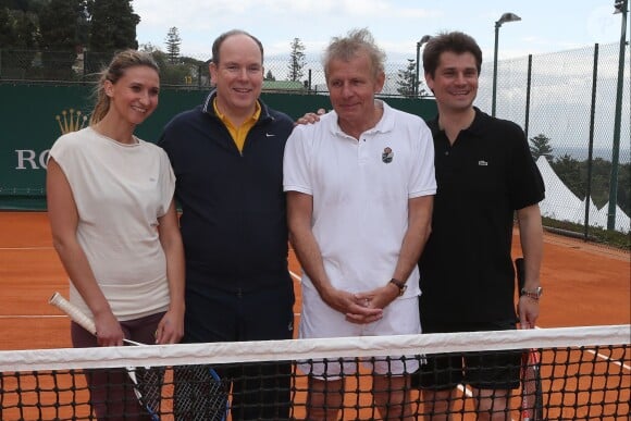Tatiana Golovin, le prince Albert II de Monaco, Patrick Poivre d'Arvor et Arnaud Boetsch à l'entraînement pour un match en double lors du Tennis Rolex Masters de Monte Carlo à Monaco le 19 avril 2014 
