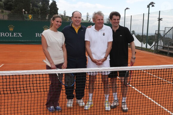 Tatiana Golovin, le prince Albert II de Monaco, Patrick Poivre d'Arvor et Arnaud Boetsch à l'entraînement pour un match en double lors du Tennis Rolex Masters de Monte Carlo à Monaco le 19 avril 2014 