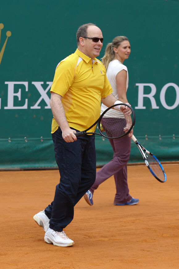 Le prince Albert II de Monaco et Tatiana Golovin à l'entraînement pour un match en double lors du Tennis Rolex Masters de Monte Carlo à Monaco le 19 avril 2014 