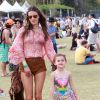 Alessandra Ambrosio et sa fille Anja au 2e jour du 2e week-end du Festival de musique de Coachella à Indio, le 19 avril 2014.