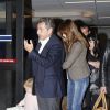 Nicolas Sarkozy, Carla Bruni-Sarkozy et leur fille Giulia à la sortie de l'aéroport LAX de Los Angeles le 25 avril 2014 où la chanteuse se produira sur scène au Luckman Fine Arts Complex de LA le 26 avril