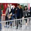 Nicolas Sarkozy, Carla-Bruni Sarkozy avec leur fille Giulia arrivent à l'aéroport de Roissy le 30 avril 2014.