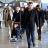 Nicolas Sarkozy, Carla-Bruni Sarkozy et leur fille Giulia à leur arrivée à l'aéroport de Roissy le 30 avril 2014.
