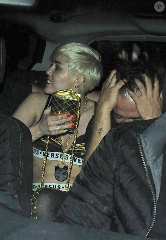 Miley Cyrus quittant le club "Madame Jojo" à Londres le 8 mai 2014.