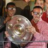 Frank Ribery et David Alaba célèbrent le titre de champion d'Allemagne avec le Bayern Munich le 10 mai 2014. 