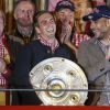 Pep Guardiola, Philipp Lahm, Hermann Gerland fêtent le titre de champion d'Allemagne avec le Bayern Munich le 10 mai 2014. 