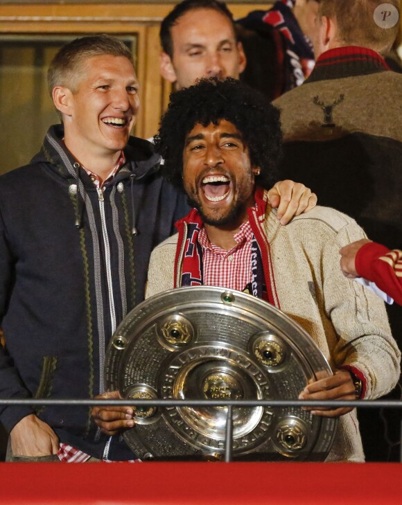 Bastian Schweinsteiger et Dante fêtent le titre de champion d'Allemagne avec le Bayern Munich le 10 mai 2014. 