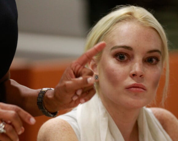 Actress Lindsay Lohan listens to the judge during her probation status hearing in Los Angeles Superior Court October 19, 2011. Judge Stephanie Sautner revoked Lohan's probation pending a hearing to determine whether she violated her probation on drunk driving and jewelry theft convictions and sent her back to jail setting bail at 0,000. Photo by Mark Boster/Pool/ABACAPRESS.COM20/10/2011 - Los Angeles