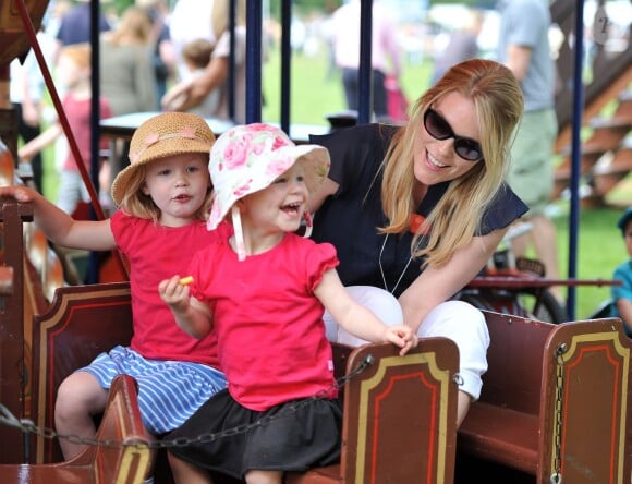 Isla, tout hilare, et Savannah Phillips avec leur maman Autumn au Royal Windsor Horse Show le 17 mai 2014.