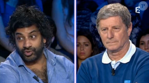 Vikash Dhorasoo et Jean-Michel Larqué sur le plateau d'On n'est pas couché sur France 2, le samedi 17 mai 2014.
