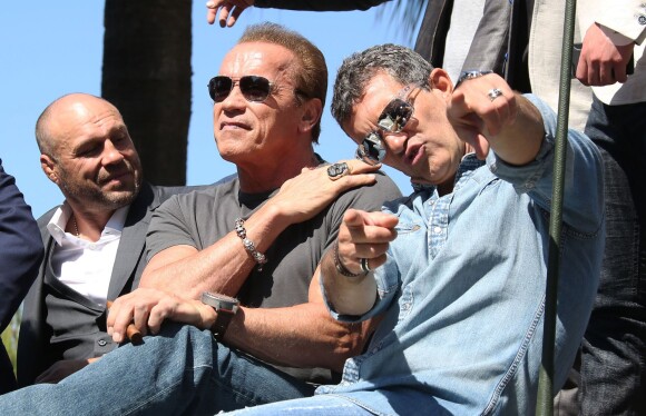 Randy Couture, Arnold Schwarzenegger, Antonio Banderas - Les acteurs du film "Expendables 3" arrivent à bord d'un char militaire devant l'hôtel Carlton pour le photocall du film dans le cadre du 67ème festival du film de Cannes, le 18 mai 2014.
