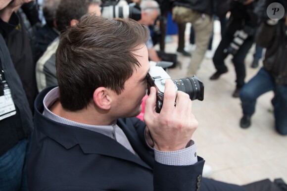 Channing Tatum prend des photos - Photocall du film "Foxcatcher" au 67e Festival International du Film de Cannes, le 19 mai 2014.