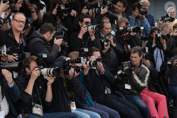 Channing Tatum prend des photos pendant le photocall de Foxcatcher au 67e Festival de Cannes, le 19 mai 2014.
