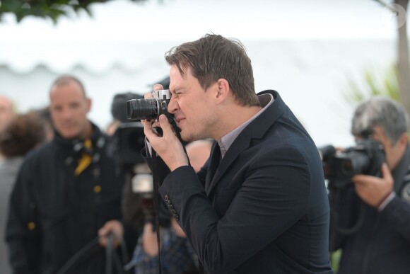 Channing Tatum prend des photos pendant le photocall de Foxcatcher au 67e Festival de Cannes, le 19 mai 2014.