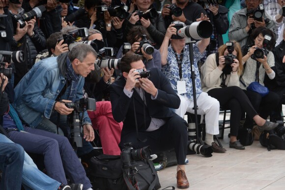 Channing Tatum prend des photos pendant le photocall de Foxcatcher au 67e Festival de Cannes, le 19 mai 2014.