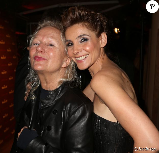 Exclusif - Agnès B, Clotilde Courau lors de la soirée pour les films "Le Sel de la Terre" et "Queen and Country" sur la plage Magnum à Cannes, le 20 mai 2014.