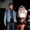 Kesha à l'aéroport de Los Angeles avec son nouveau boyfriend, le 22 mai 2014.
