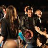 John Travolta lors de la projection de Pulp Fiction au Cinéma de la plage durant le Festival de Cannes, 20 ans après sa Palme d'or, le 23 ami 2014
