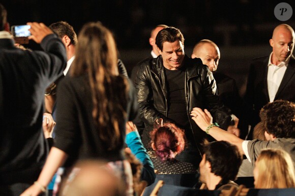 John Travolta lors de la projection de Pulp Fiction au Cinéma de la plage durant le Festival de Cannes, 20 ans après sa Palme d'or, le 23 ami 2014
