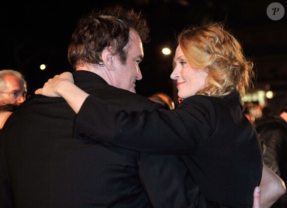 Quentin Tarantino, Uma Thurman lors de la projection de Pulp Fiction au Cinéma de la plage durant le Festival de Cannes, 20 ans après sa Palme d'or, le 23 ami 2014