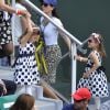 Charlene et Myla, les jumelles de Roger Federer lors du match de leur papa au premier jour de Roland-Garros à Paris, le 25 mai 2014 à Paris, pressées de s'éclipser