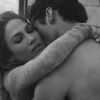 Jennifer Love sexy dans les bras d'un ténébreux brun dans le clip de "First Love", mis en ligne le 29 mai 2014.