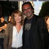 Emmanuel Chain et sa femme Valérie Guignabodet - Arrivées à l'avant-première du film 'Sous les jupes des filles' à l'UGC Normandie sur les Champs Elysées à Paris le 2 juin 2014.