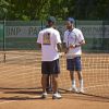 Cyril Hanouna et Sylvain Wiltord à Roland-Garros pour participer au Trophée des personnalités, le vendredi 6 juin 2014.
