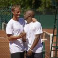 Arnaud Lemaire et Sylvain Wiltord à Roland-Garros pour participer au Trophée des personnalités, le vendredi 6 juin 2014.