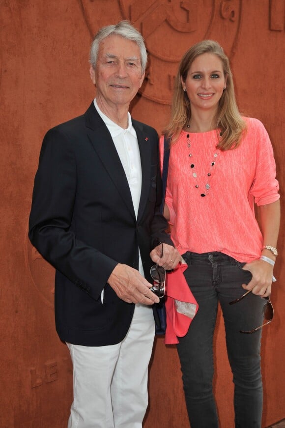 Jean-Claude Narcy et Laure Brovelli au village des Internationaux de France de tennis de Roland Garros à Paris, le 7 juin 2014