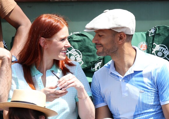 Audrey Fleurot et son nouveau compagnon Djibril Glissant, très complices, assistent à la finale dame lors des Internationaux de France de tennis de Roland Garros à Paris le 7 juin 2014