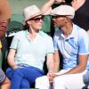Audrey Fleurot et son nouveau compagnon Djibril Glissant assistent à la finale dame lors des Internationaux de France de tennis de Roland Garros à Paris le 7 juin 2014