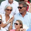 Christine Lagarde et son compagnon Xavier Giocanti assistent à la finale dame des Internationaux de France de tennis de Roland Garros à Paris le 7 juin 2014