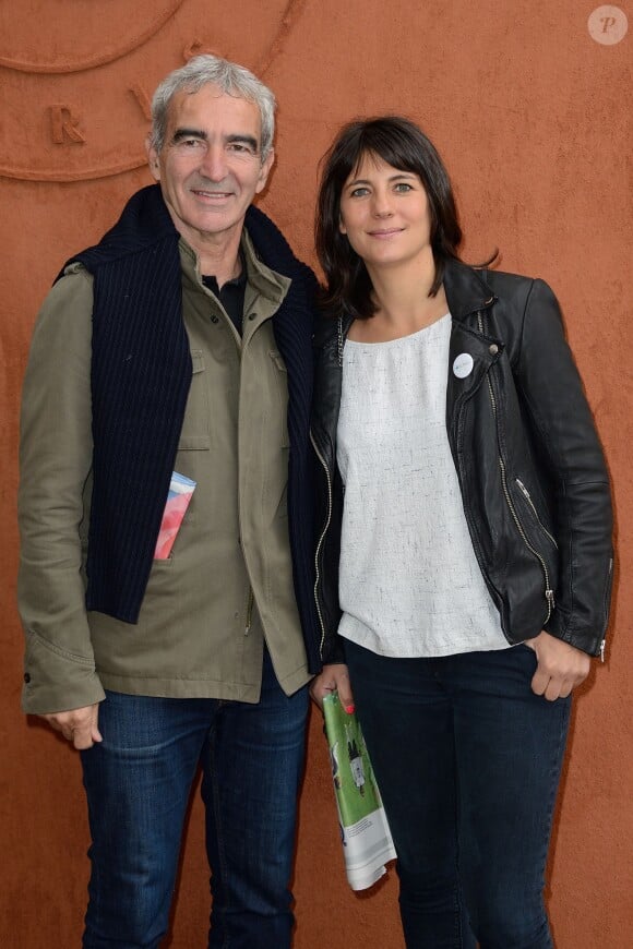 Raymond Domenech et Estelle Denis au Village Roland-Garros, le 27 mai 2014 à Paris