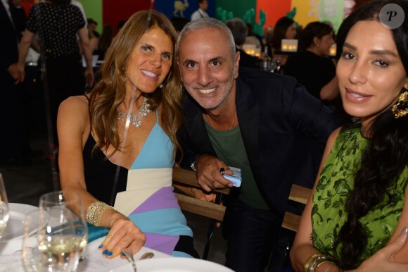 Anna Dello Russo, Alessandro Dell'Acqua, Lea T lors du dîner "Convivio 2014" à Milan, le 12 juin 2014.